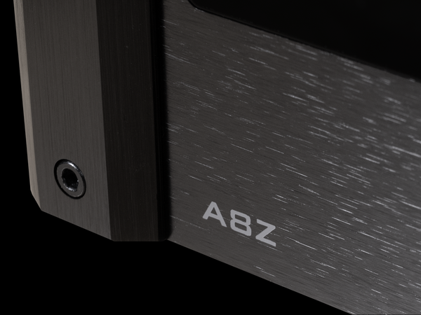 Close-up of a metallic device with 'A8Z' branding on a black background