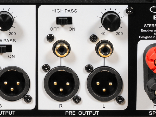Audio equipment panel with knobs and connectors on a white background