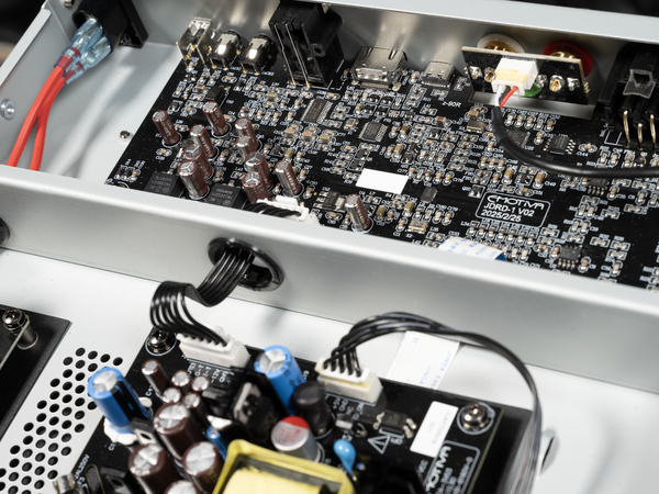 Close-up of electronic circuit board with various components and branding