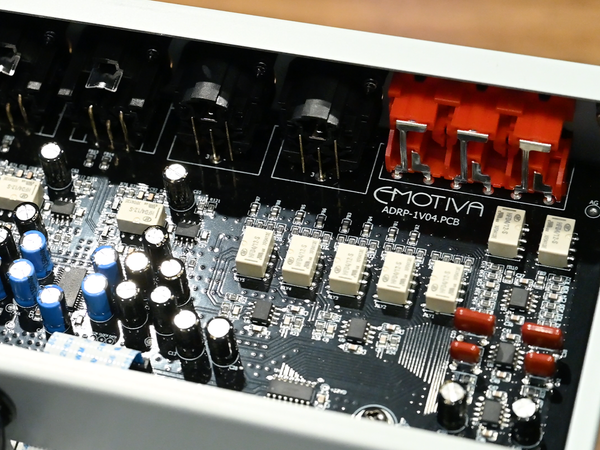 Close-up of a circuit board with 'Emotiva' branding
