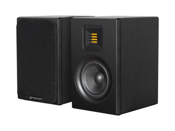 A pair of black Airmotiv XB1 bookshelf loudspeakers with visible woofer and one with black grill