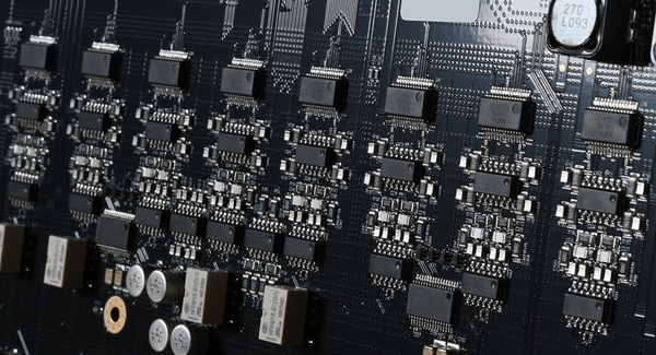 Close-up of a computer motherboard with various electronic components.