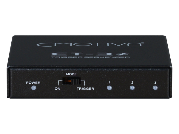 Emotiva ET-3+ Trigger Expansion Module in black color showing mode indicators on the front panel.