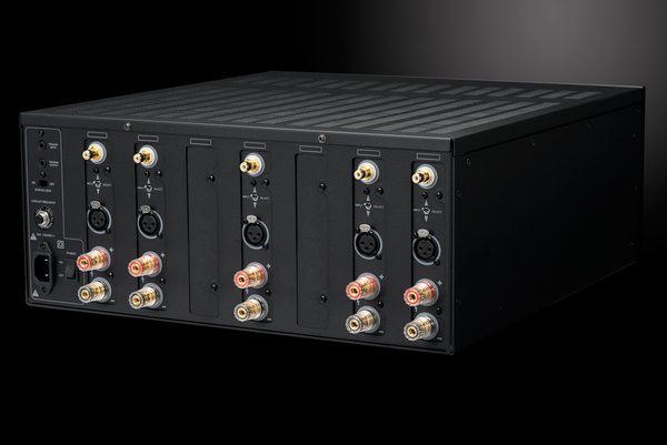 Photo of the rear isometric view of the XPA Gen3 5 Channel Amplifier on a dramatic gray background showing off the inputs and outputs